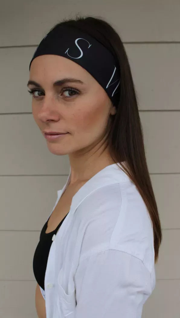 Black sport headtie with light geometric print, side profile