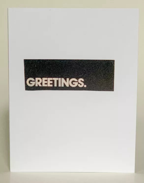 Anytime greeting card, dark cover panel with 'GREETINGS.' text