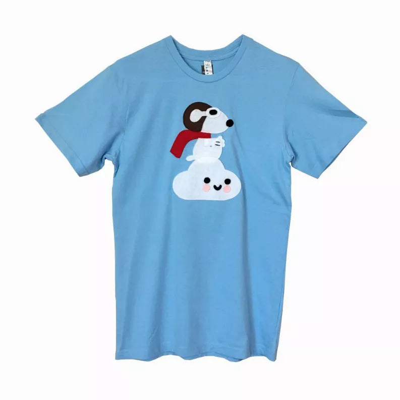 Front view adult blue graphic T-shirt with Snoopy and snowman illustration