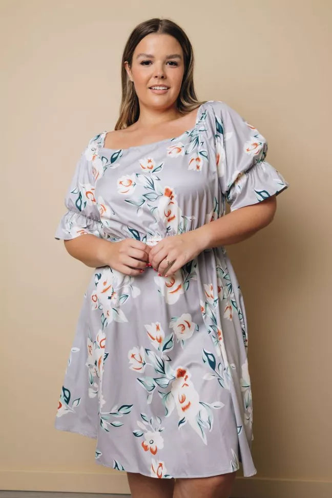 Light blue floral midi dress with square neckline and puff sleeves, front view