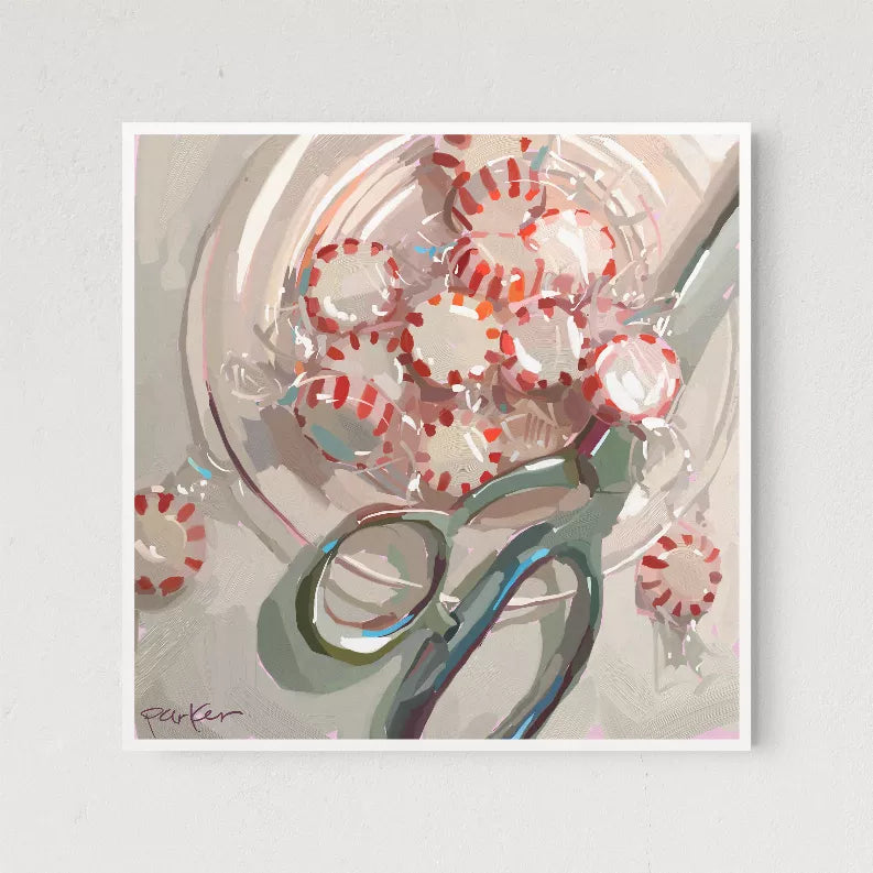 Close-up framed abstract wall art print with red circular pattern and green-grey shapes