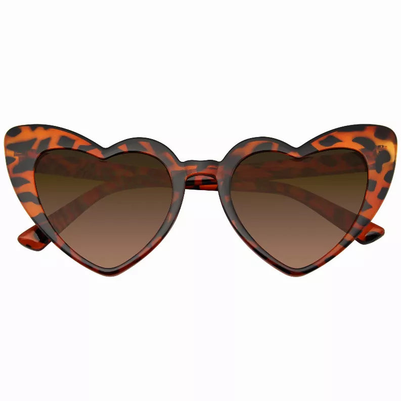Heart-shaped cat-eye sunglasses with tortoiseshell orange frames and dark lenses