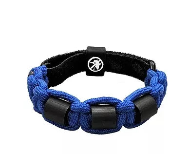 Blue braided shark repellent bracelet with black blocks and round logo emblem