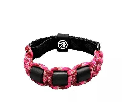 Pink/red braided shark repellent bracelet with black blocks and round logo emblem