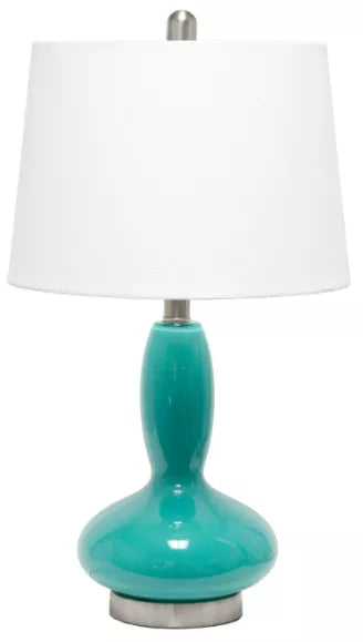 Teal glass table lamp with white fabric drum shade and silver base