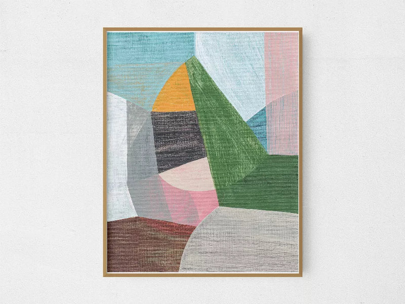 Framed abstract geometric wall art with blue, green, pink, and brown blocks