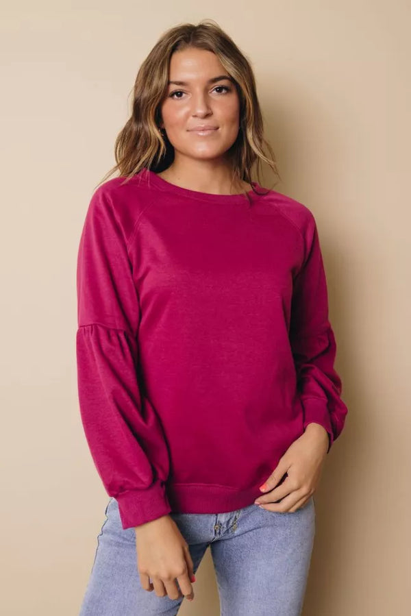 Magenta balloon-sleeve crewneck sweatshirt, long sleeves, pullover fit