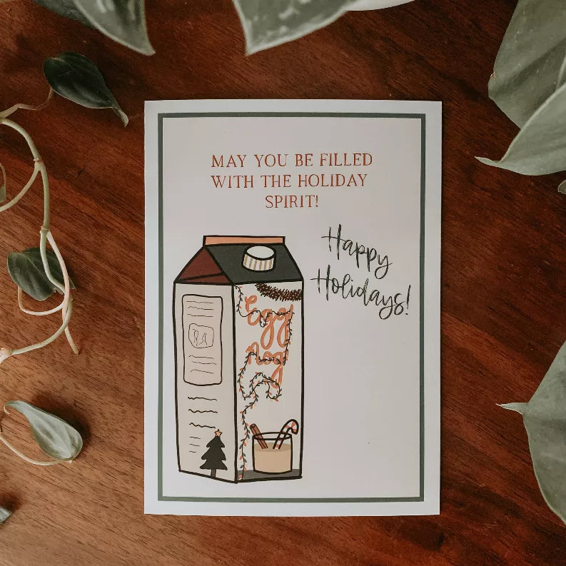 Holiday greeting card: 'Happy Holidays!' over decorated house illustration