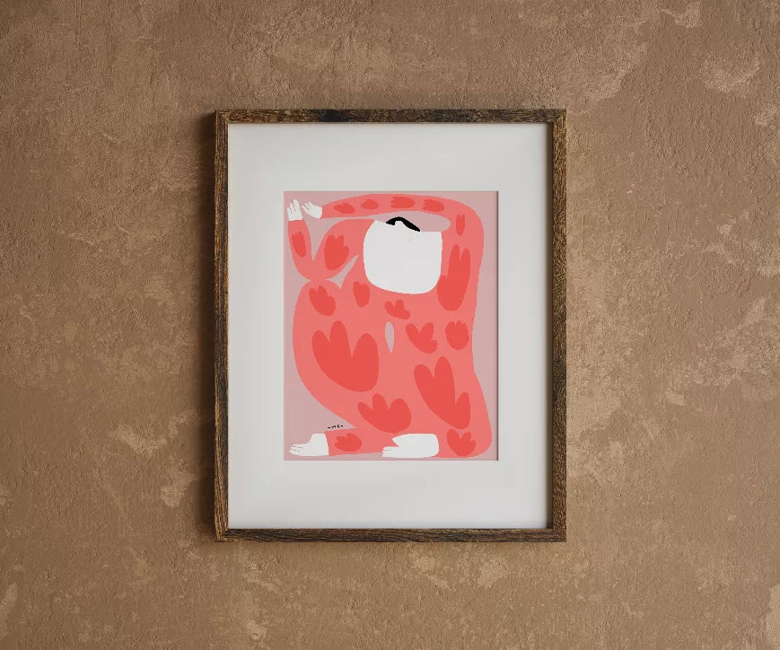 Framed wall art: red camouflage pattern with white cat illustration in dark frame