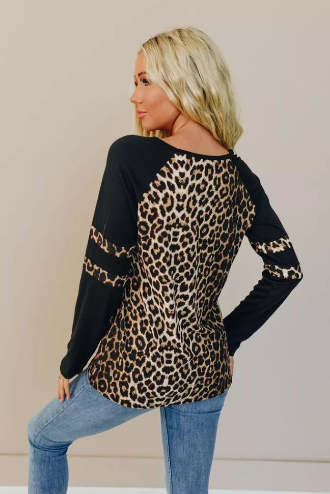 Back view leopard-print long-sleeve tee with black sleeves and graphic striping