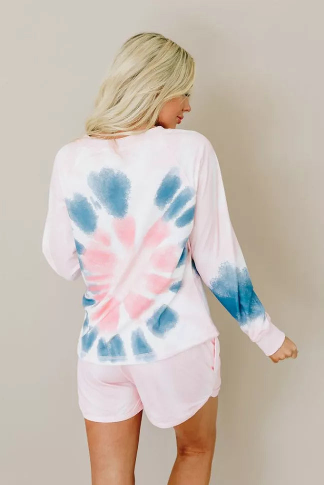 Tie-dye lounge set back: pink/blue pullover sweatshirt with white drawstring shorts