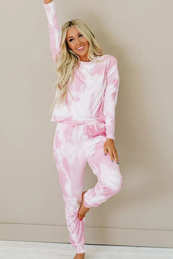 Pink tie-dye cotton loungewear set with long-sleeve top and cuffed jogger pants, front view