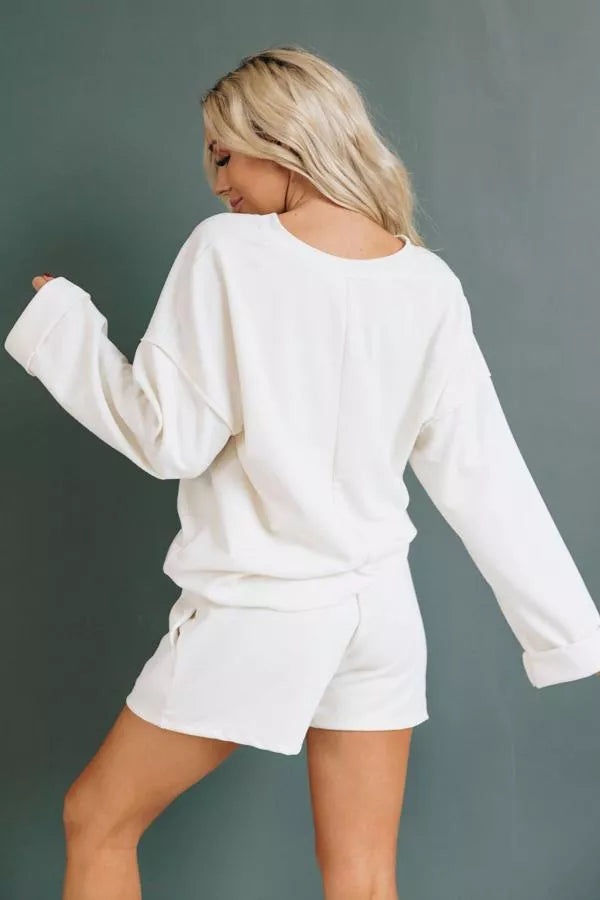 Cream two-piece loungewear set, long-sleeve back top and drawstring shorts