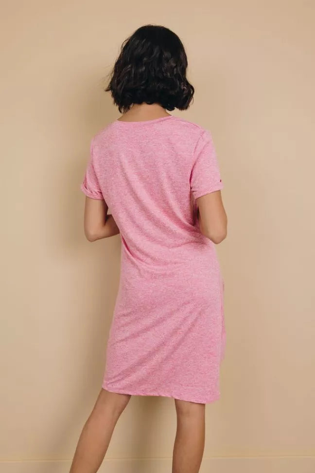 Pink knotted mini dress, back view with short sleeves and straight hem