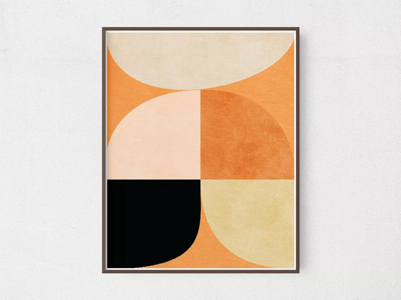 Framed abstract wall art featuring orange, cream, and black curved panels