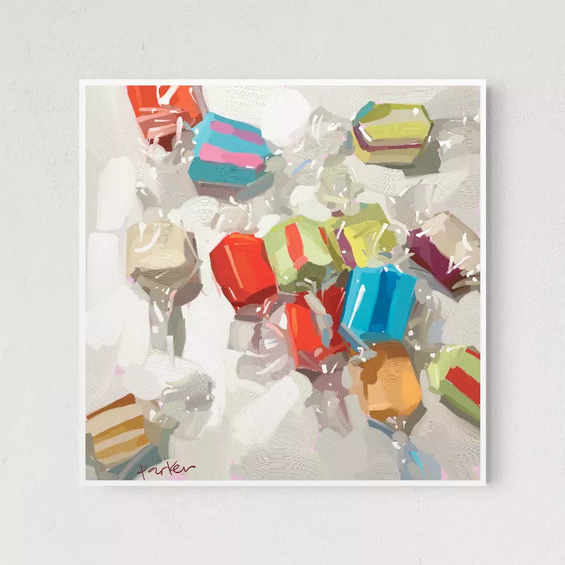 White-framed abstract art print with multicolor geometric candy shapes and corner signature