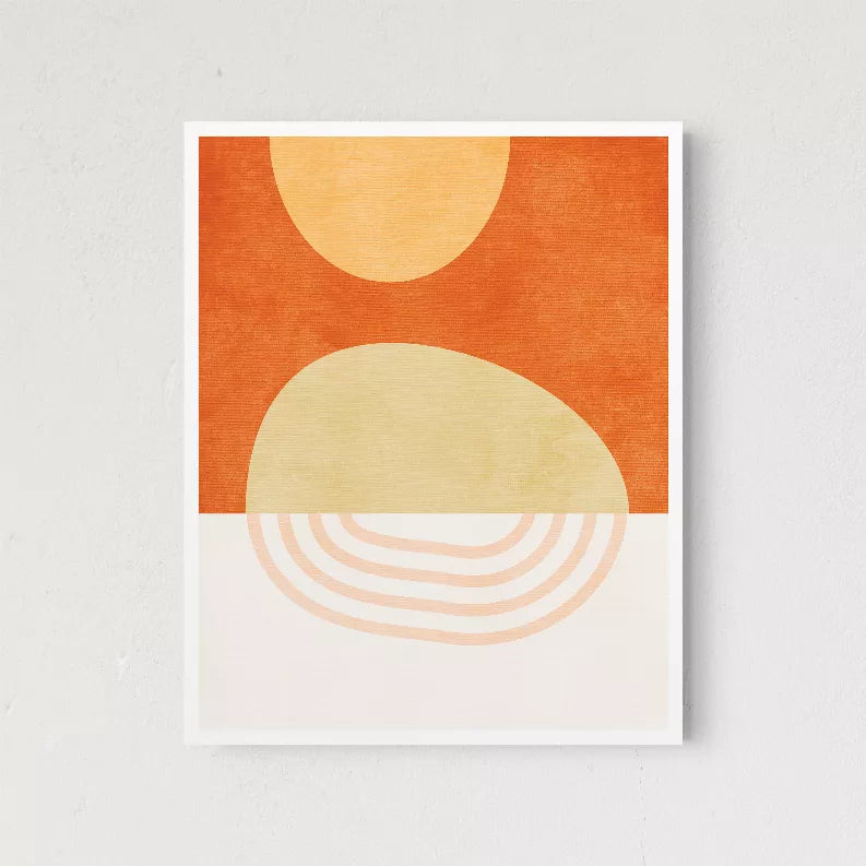 Framed abstract wall art print with orange top, beige dome shape, and curved striped lines