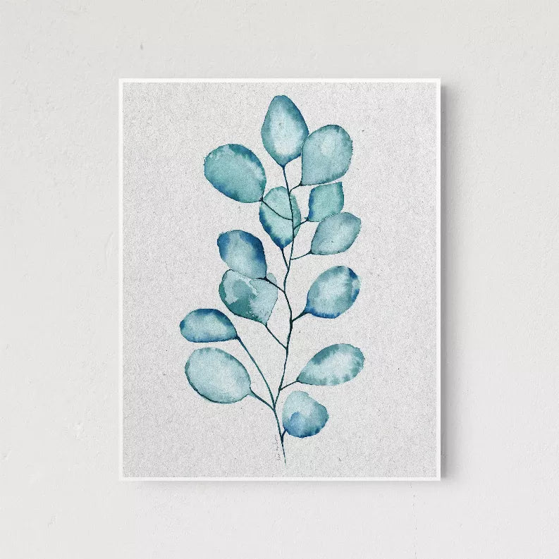 Eucalyptus leaves square wall art with blue-green leaf cluster and white border
