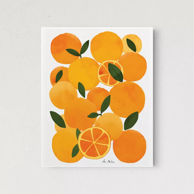 Centered framed orange fruit wall art with citrus slices and green leaves, white border