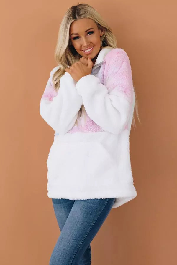 Tie-dye fuzzy pullover, white with pink and light blue front and sleeves.