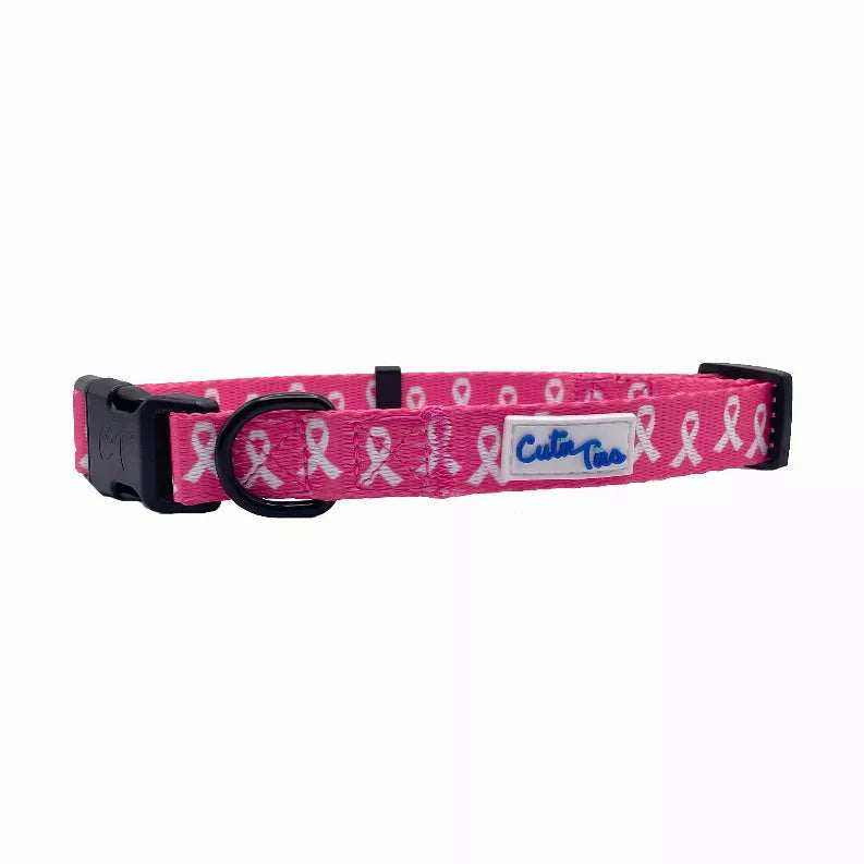 Pink dog collar with white ribbon pattern, black buckle, D-ring and leash loop