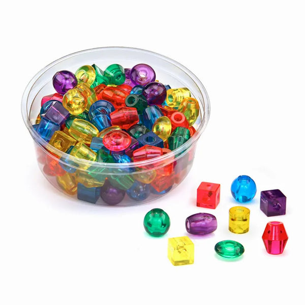 Assorted large translucent plastic beads, multicolor in clear storage cup