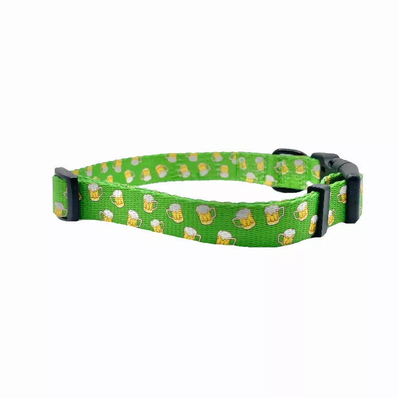 Green patterned dog collar with black buckle and adjustable strap