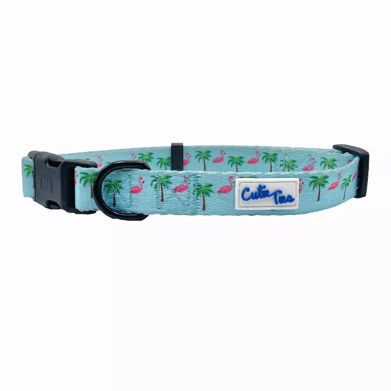 Flamingo and palm tree dog collar in light blue with black buckle and D-ring, “Cutie paws” tag