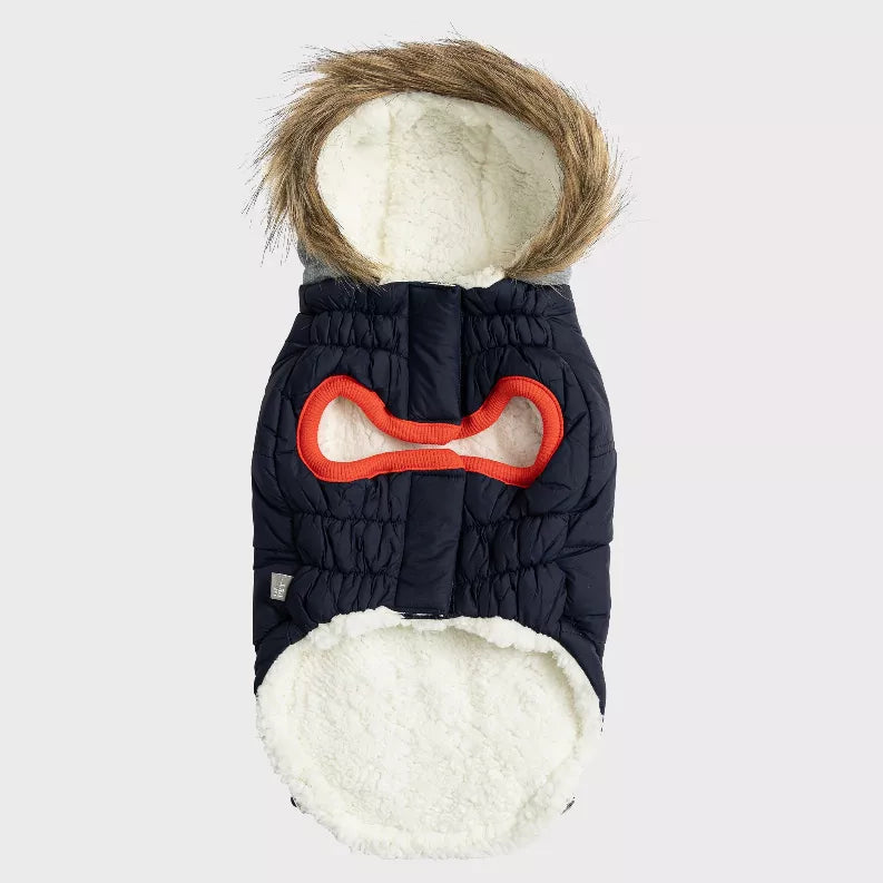 Navy pet parka back with gray hood lining, orange opening, and white sherpa belly