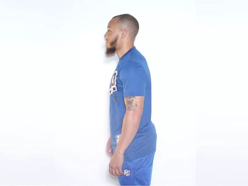 Blue sports T-shirt side view, front graphic visible on the chest