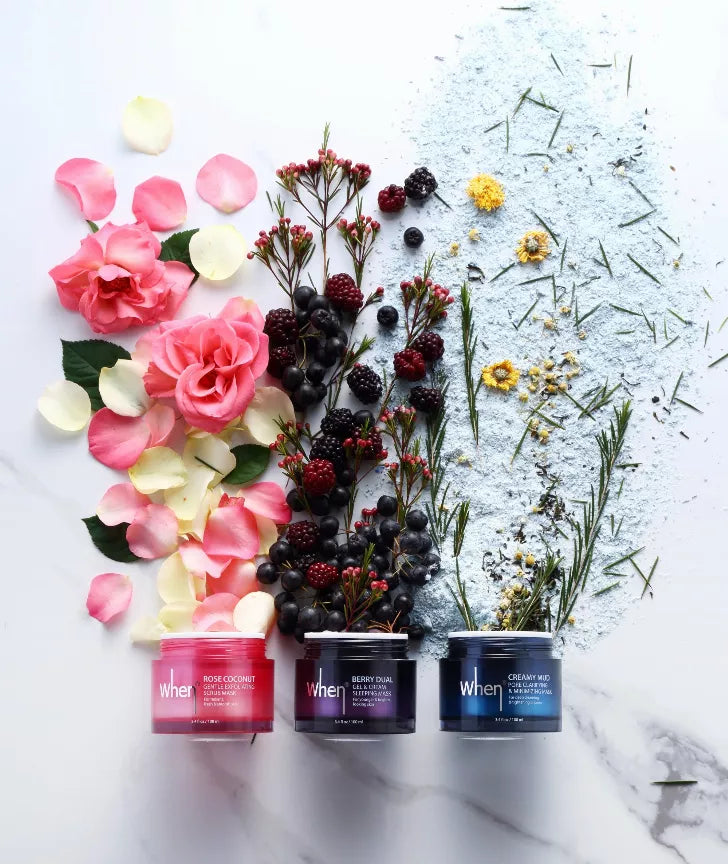 Three mini cream mask jars with visible creams in pink, purple, and blue tones