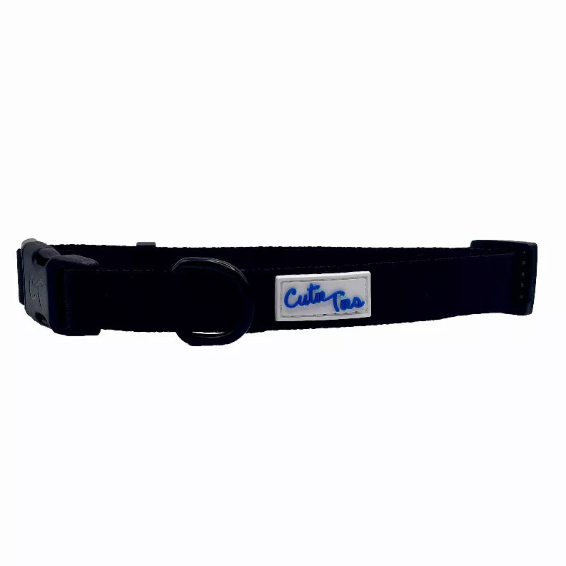 Navy dog collar with round metal buckle and blue logo tag