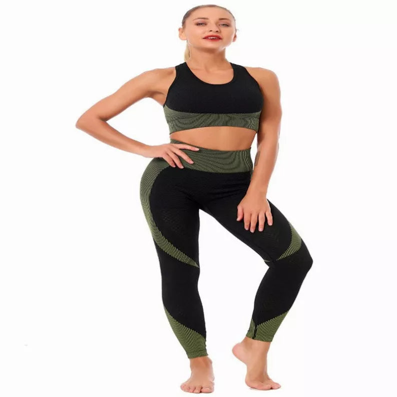 Padded black sports bra and olive high-waist yoga leggings set with cutout details