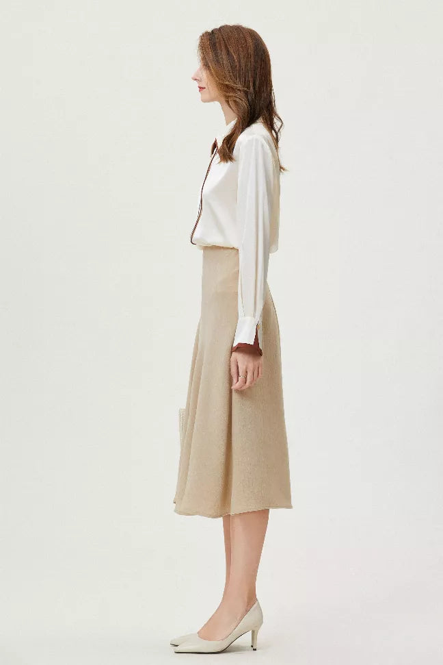 White silk camellia-style button shirt with brown-trim collar, side view