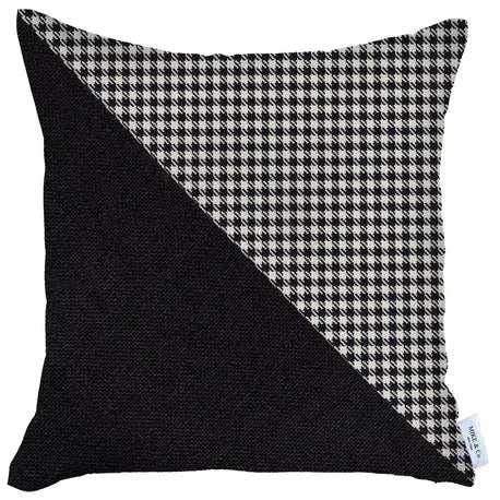 Throw pillow with black fabric and white houndstooth diagonal panel, square corners