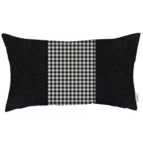 Rectangular throw pillow with black sides and white houndstooth center panel