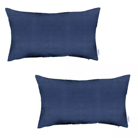 Pair of rectangular blue faux leather throw pillows, smooth faux leather finish