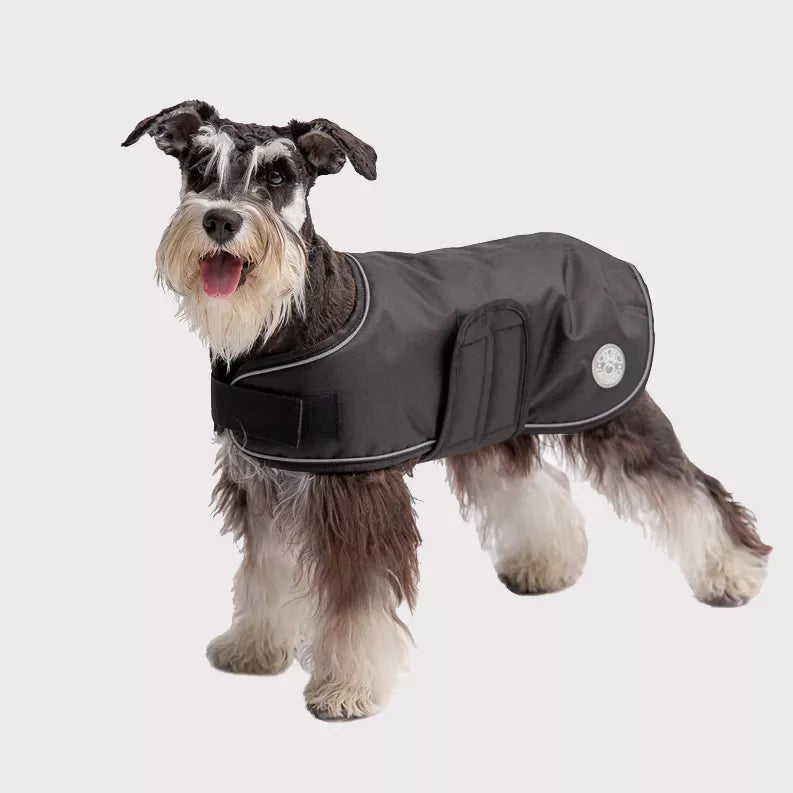 Dog blanket jacket in dark gray with belly strap and circular logo patch on side