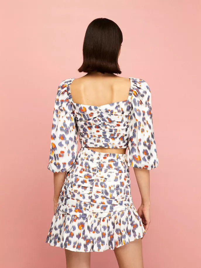 Leopard print puff-sleeve mini skirt set, back view with ruched waist panel