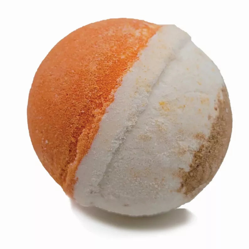 Round bath bomb with orange side and white side wedge split