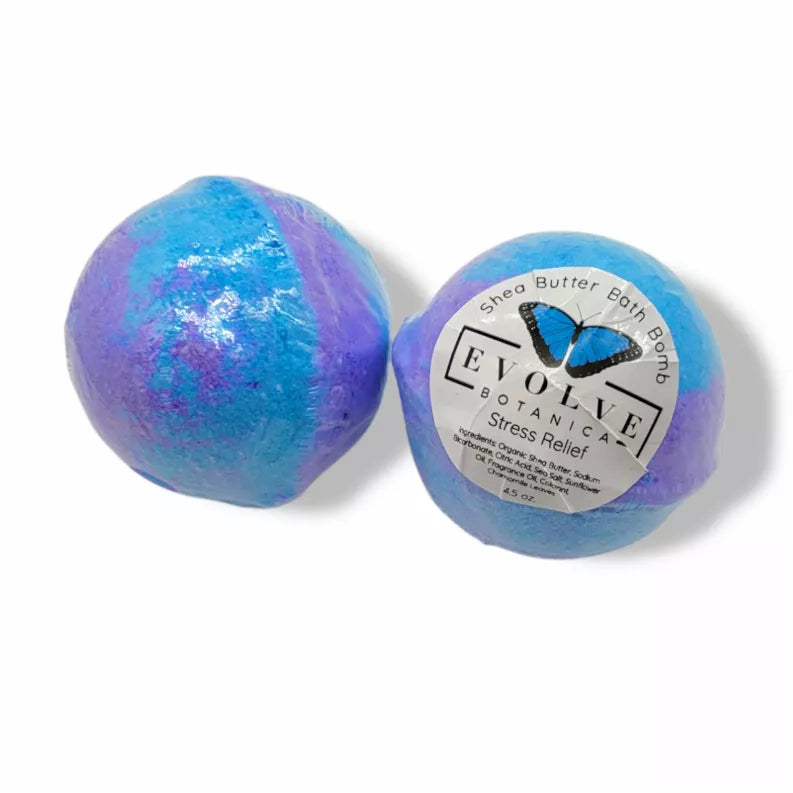 Purple bath bomb with round label and glossy speckled surface