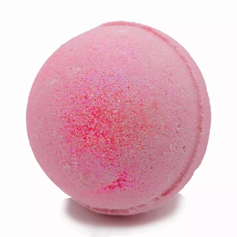 Pink round bath bomb with fine glittery texture