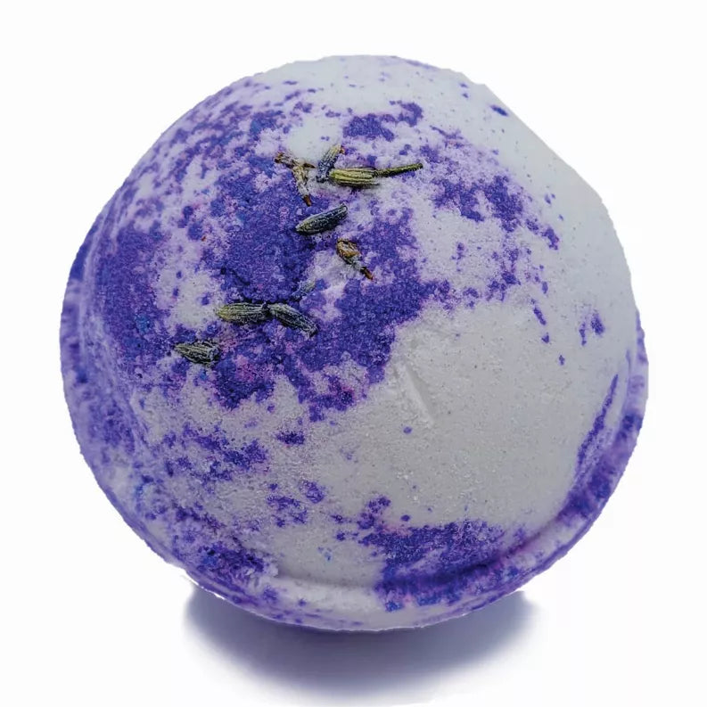 Purple round bath bomb with embedded dried flowers