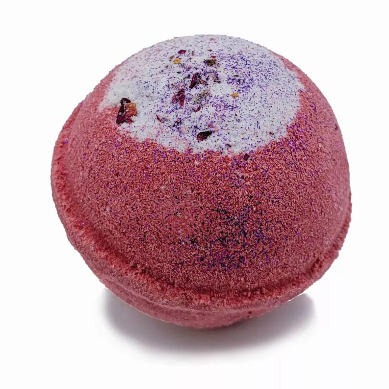 Red and purple round bath bomb with speckled top