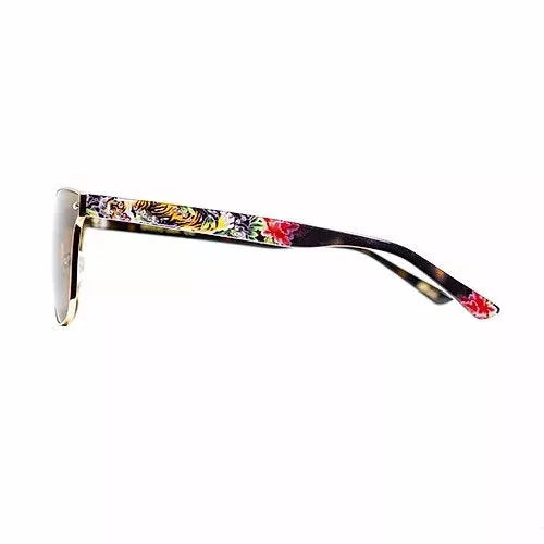 Sunglasses with black frame and colorful tiger-print temple arms, clear lenses.