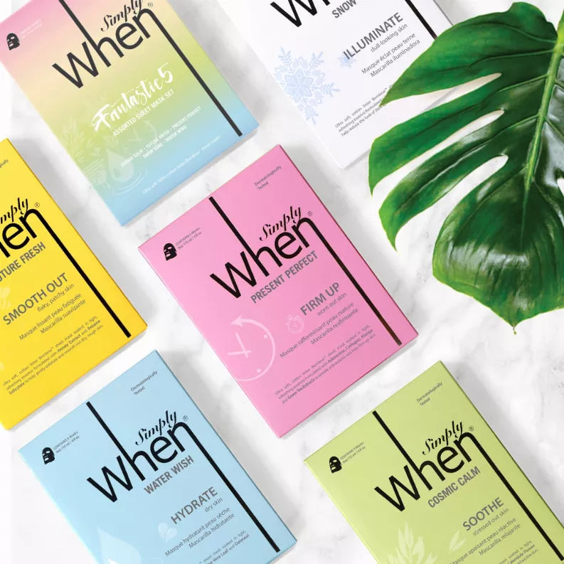 Five Simply When sheet mask pouches in assorted colors laid out with a leaf for styling.