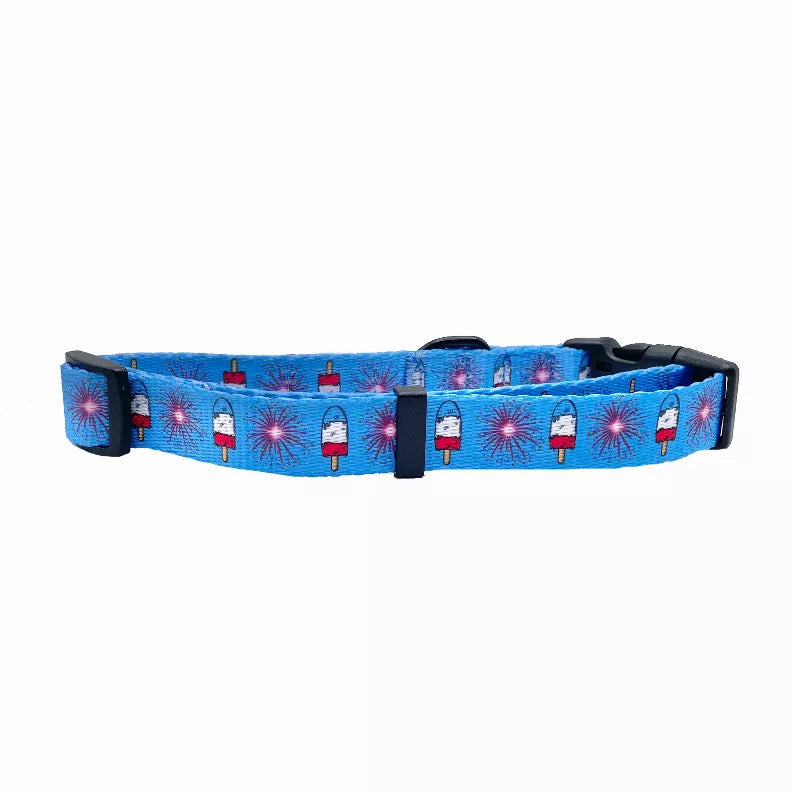 Blue dog collar with black buckle and popsicle-and-sparkler print