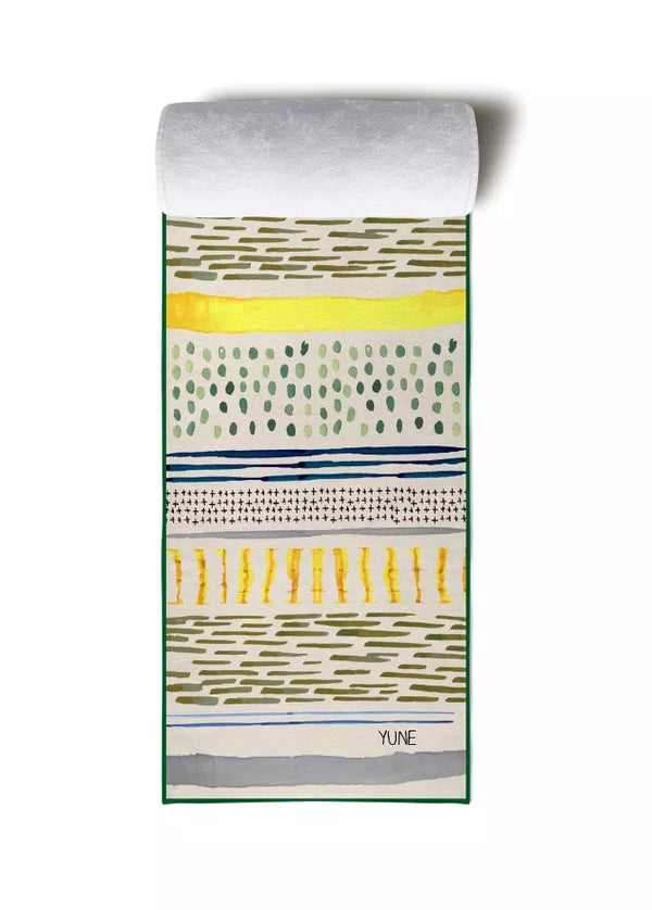 Yoga towel bundle, rolled with green geometric pattern and gray top edge