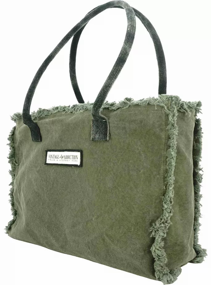 Olive canvas market tote with logo label, dark handles, and frayed side trim
