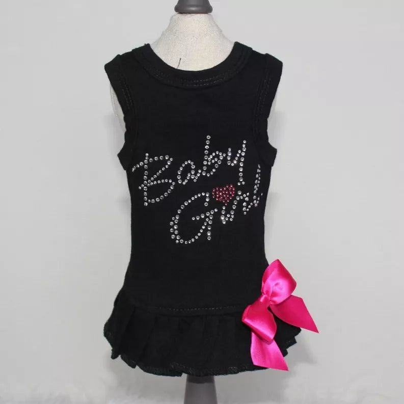 Black sleeveless baby dress with rhinestone 'Beauty' and pink bow on skirt hem